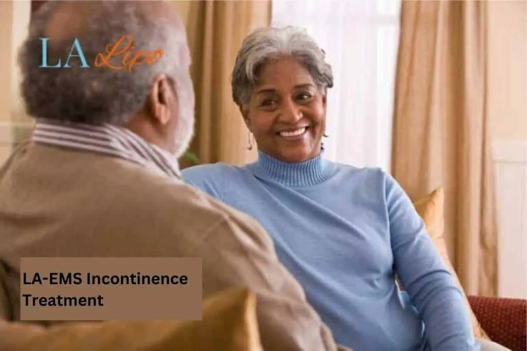 Couple sat smiling at each other - LA-EMS treatment Sheffield